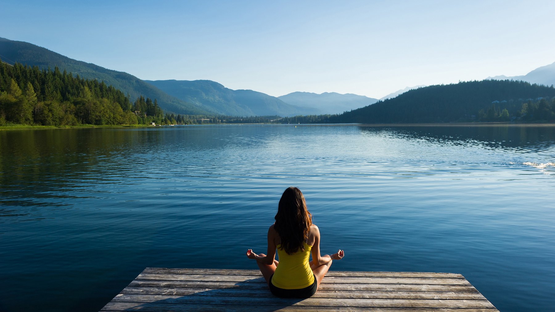 Person meditating on low carbon solutions